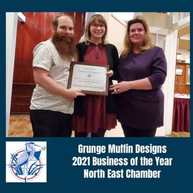 Business of the Year - Grunge Muffin Designs (owners Brandon Boas & Meredith S. K. Boas (left)) (award presented by Tracy Reynolds (right))