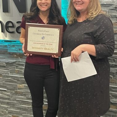 Business of the Year - Integrity Real Estate (award collected by Kristin Lewis(left)) (award presented by Tracy Reynolds (right))
